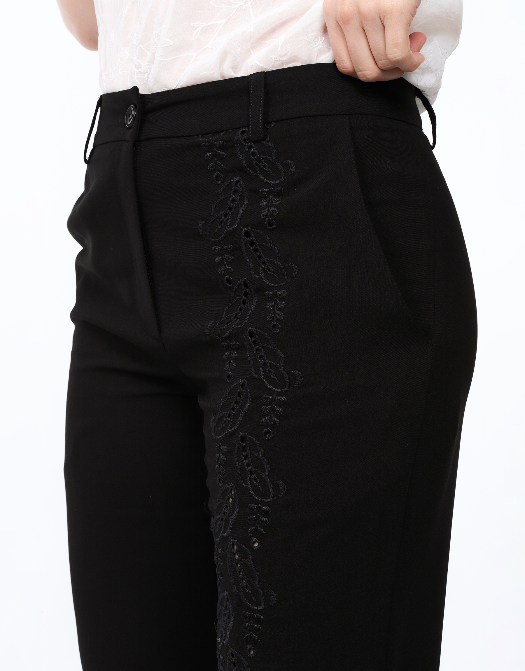 Straight trousers in black embroidered crepe